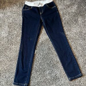 Denim jeans with gray stretchy band